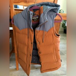 Patagonia Rust and Slate Hooded Vest
Perfect condition, worn a handful of times.